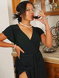Elegant Adena strips off her black dress and spreads her legs