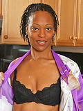 37 year old ebony chick gets naughty in the kitchen